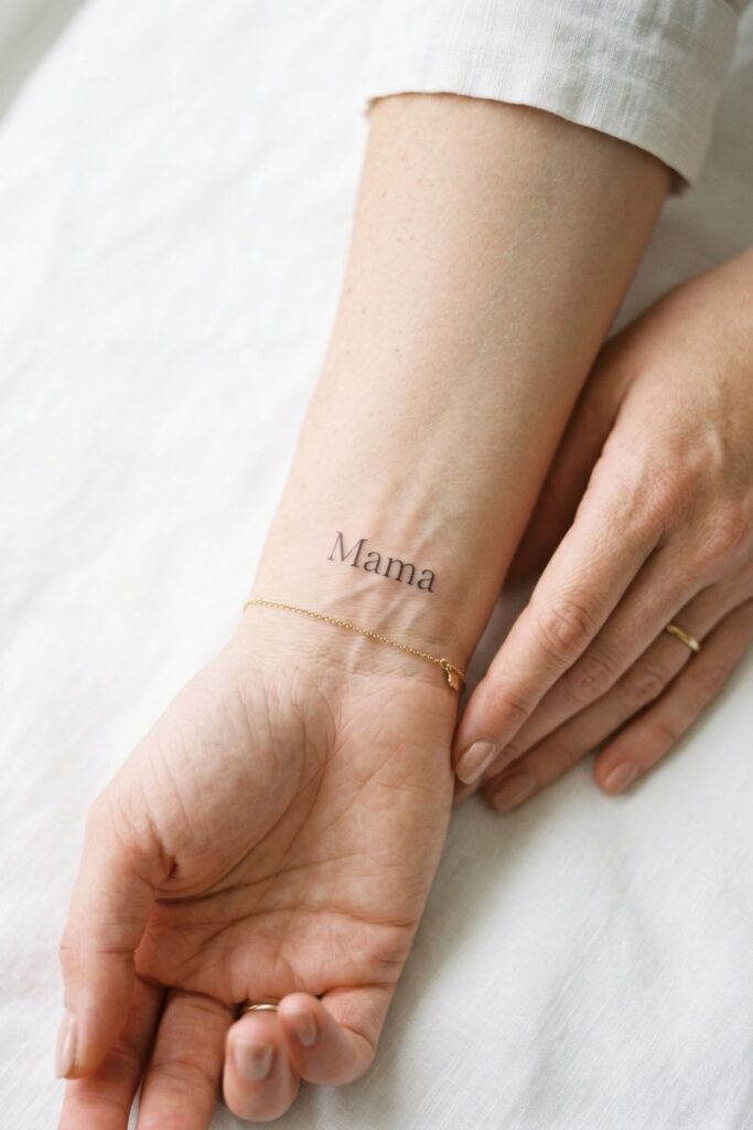 The Single Word "Mama" Tattoo