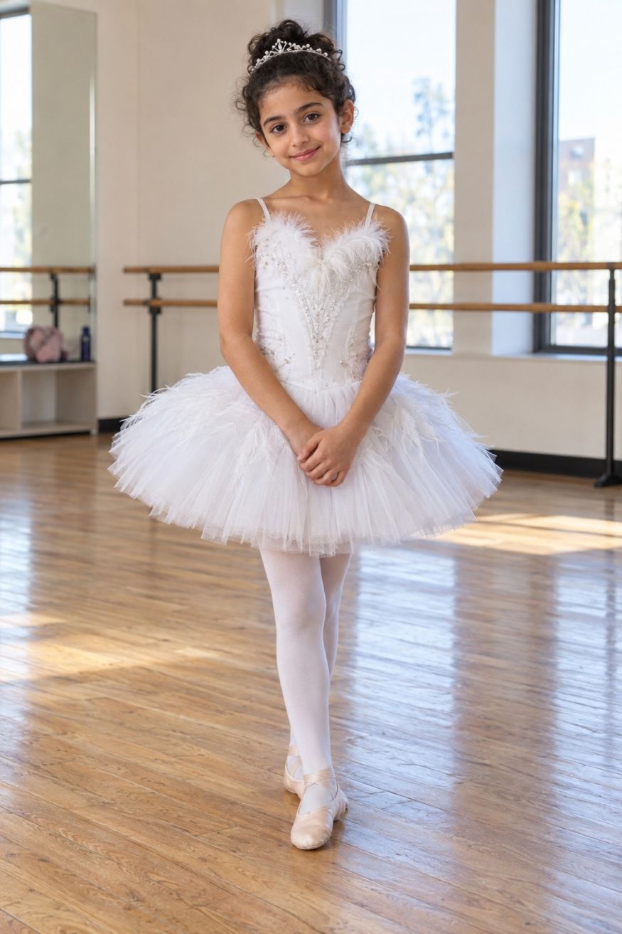 Feathered white tulle ballerina dress worn over thick thermal white tights with ribbon lace slippers